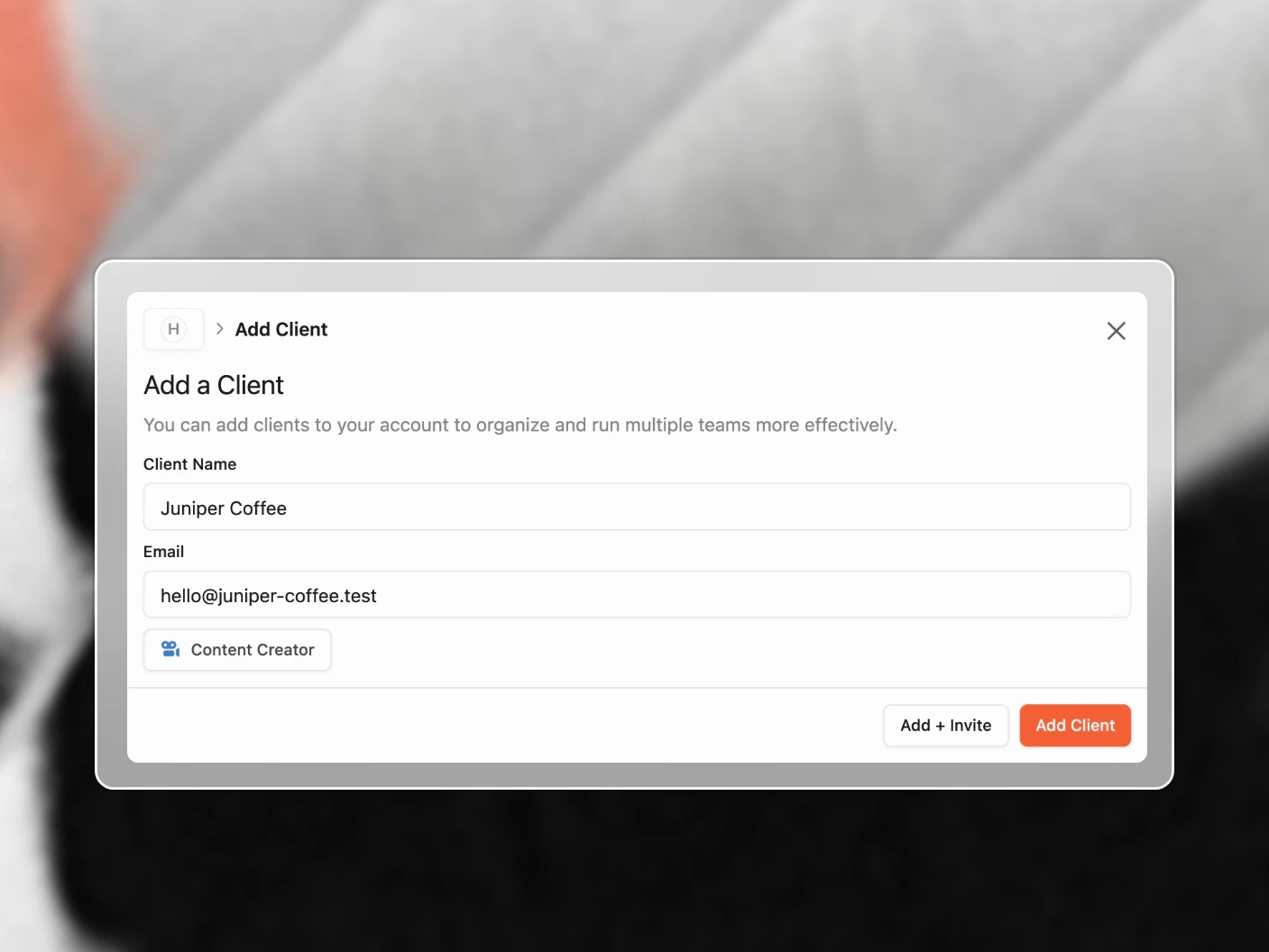 The new client form with a client name and email filled in, above the Add Client and Add + Invite buttons