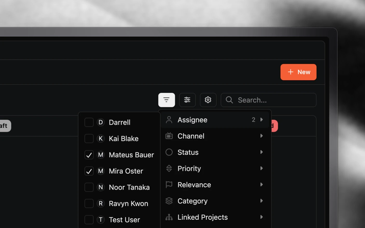 The projects board's filter menu open on Assignee, with two teammates ticked and a count of 2 beside the filter
