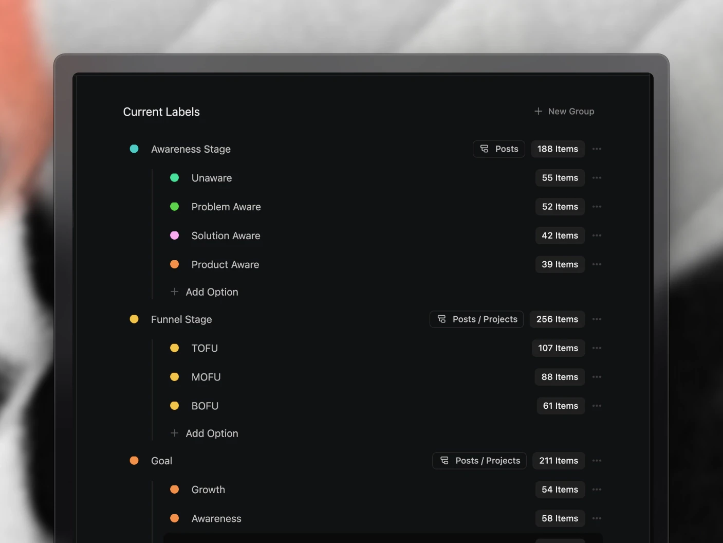 Label groups in organization settings, each with its coloured options, what it applies to, and how many items use it